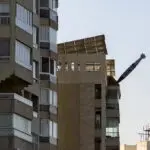 Middle East latest: Workers search through rubble in eastern Lebanon where Israeli strike killed 13