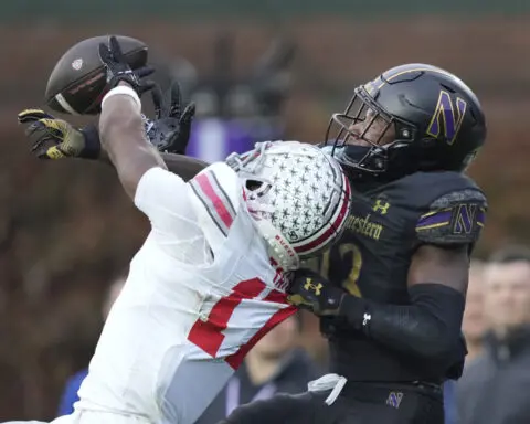 Ohio State receiver Carnell Tate scores two touchdowns in his Chicago homecoming