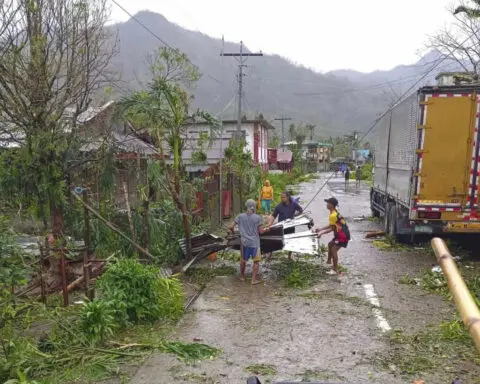 Latest typhoon lashes the Philippines, causing tidal surges and displacing massive numbers of people