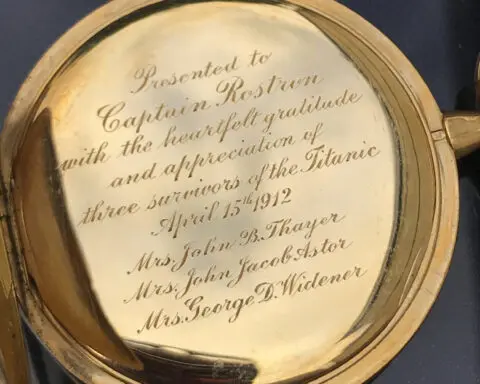 A gold pocket watch given to the captain who rescued Titanic survivors sells for a record price