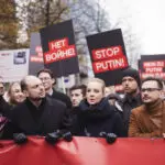 Putin critics lead a march in Berlin calling for democracy in Russia and an end to war in Ukraine