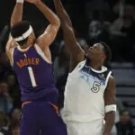 Randle hits 3 at the buzzer to lift Timberwolves over Booker, Suns with 120-117 win