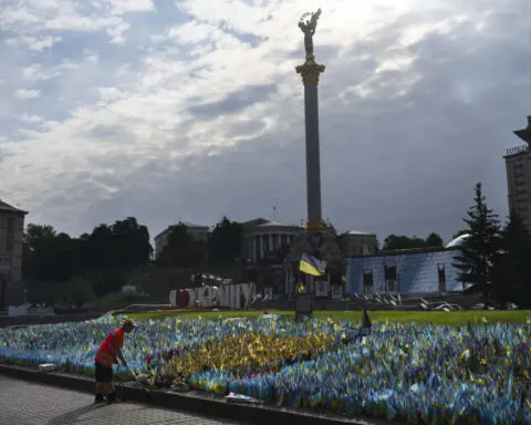 A makeshift memorial grows in Ukraine’s capital after 1,000 days of war