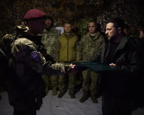 Ukraine's Zelenskiy visits embattled frontline towns