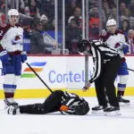 NHL referee Mitch Dunning communicative, can move extremities following violent collision