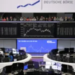 Miners, real estate lead gains in European shares