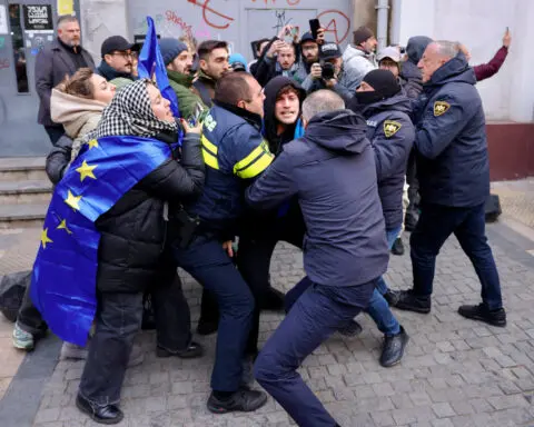 Georgia detains 16 protesters after clashes over disputed election