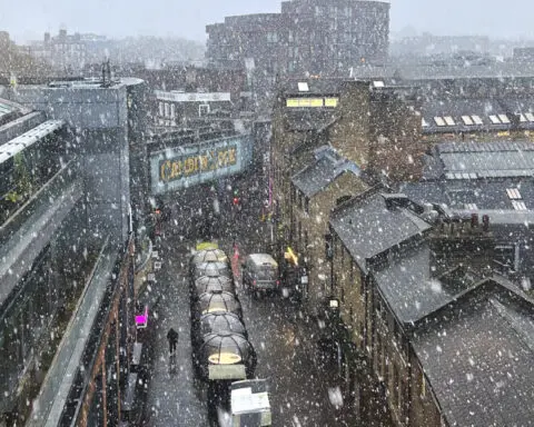 School closures and travel delays as Arctic air brings snow and sleet to parts of the UK