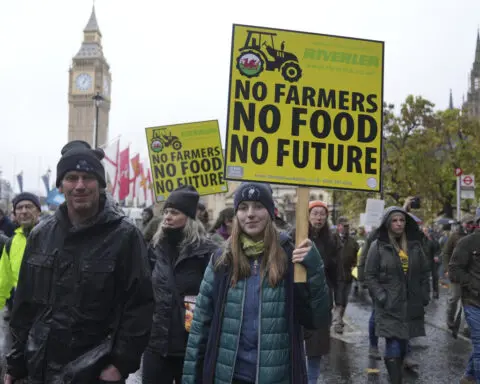 Thousands of UK farmers descend on Parliament to protest a tax they say will ruin family farms