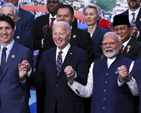 Biden appeals to world leaders to stay in the climate fight as Trump casts shadow