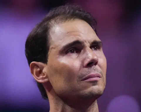 An emotional Rafael Nadal retires at the Davis Cup after he loses and Spain is eliminated