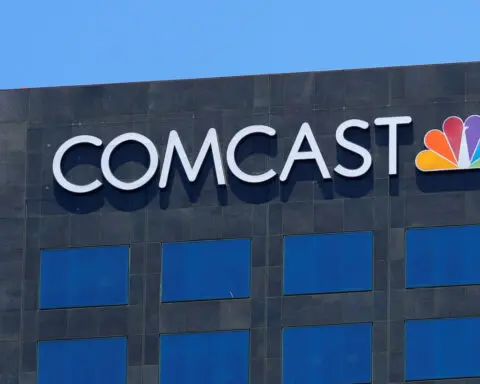 Comcast to proceed with plans to spin off its cable channels, sources say