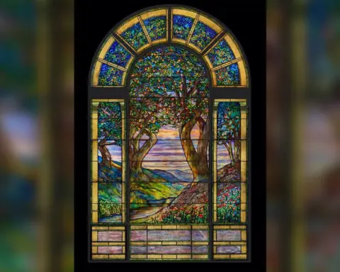 Stained-glass Tiffany window sells for record $12.48 million at auction