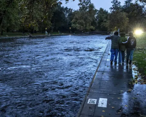 Storm dumps record rain and heavy snow on Northern California. Many in Seattle still without power