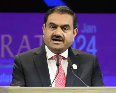 India's Adani Group shares show some recovery despite uncertainty over US bribery and fraud charges