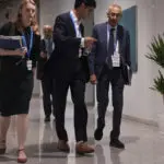 Negotiators work through the night at UN climate talks to try to reach a cash deal for poor nations