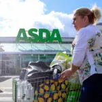 Britain's Asda brings back industry veteran Leighton to lead business