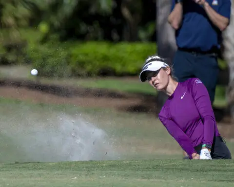 Angel Yin holes 3 long putts for 2-shot lead in LPGA finale. Nelly Korda shoots 66 to trail by 4