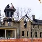 Fire destroys historic Meinhardt Mansion, property owner in custody