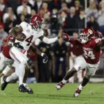 Arnold, Robinson run for more than 100 yards as Oklahoma stuns No. 7 Alabama 24-3