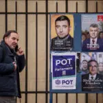 Romanians cast ballots in presidential race that could pit nationalist against leftist in a runoff