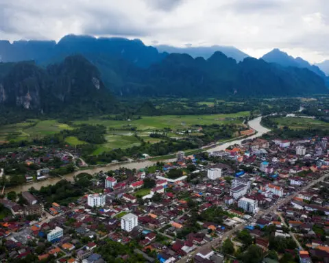 Laos vows justice after tainted alcohol kills tourists