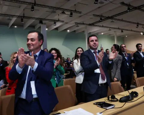 World agrees to climate deal on financial aid for developing countries after summit nearly implodes