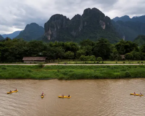 New Zealand citizen poisoned by tainted alcohol in Laos returns home