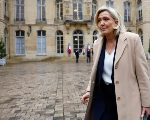 Le Pen makes new threat to withdraw support for French government