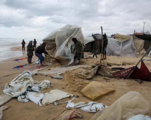 Rainstorms flood tents of Gaza's displaced as Israel steps up strikes