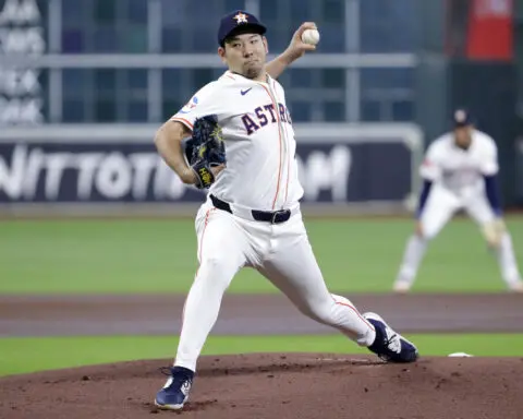 Pitcher Yusei Kikuchi and Los Angeles Angels agree to a $63 million, 3-year contract, AP source says