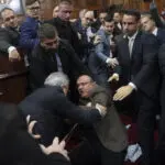 Scuffles in Serbian parliament amid accusations over fatal rail station roof collapse