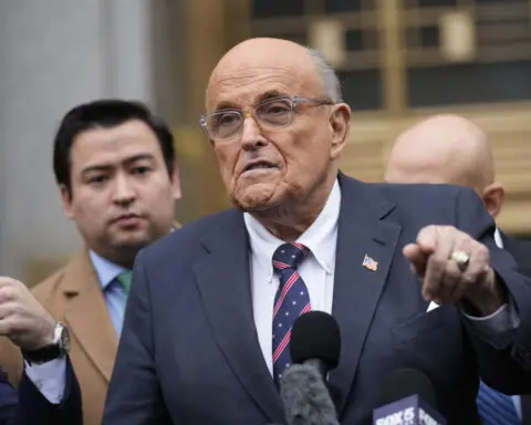 Rudy Giuliani draws rebuke for a courtroom outburst accusing judge in assets case of being unfair