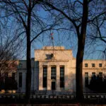 Fed cites economic volatility, uncertainty as reasons to go slow on rate cuts