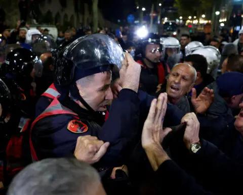 Albania police fire tear gas, water cannon at anti-government protesters