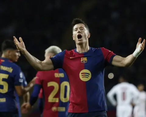 Lewandowski joins Ronaldo and Messi in Champions League 100-goal club. Haaland nets 2 but City draws