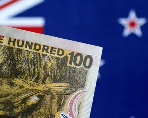 New Zealand cuts rates by 50 bps, flags further easing