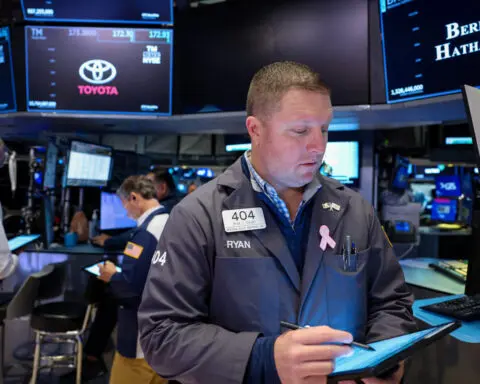 Wall Street stocks end lower after inflation data, tech stocks push Nasdaq down