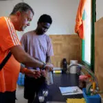 Teen Gambian migrant finds support and a father figure in Canary Islands