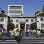 South Korea's central bank cuts a key rate to nurse a slower economy