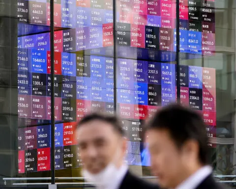 Stock market today: World shares are mostly higher after Big Tech losses pull Wall St lower