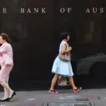 Australia central bank says inflation too high for near-term rate cut