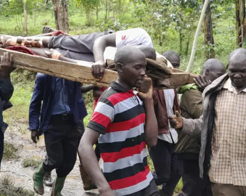 Death toll rises to at least 15 after landslides bury 40 homes in eastern Uganda