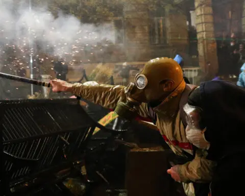 Many thousands rally to oppose Georgian government after break with EU