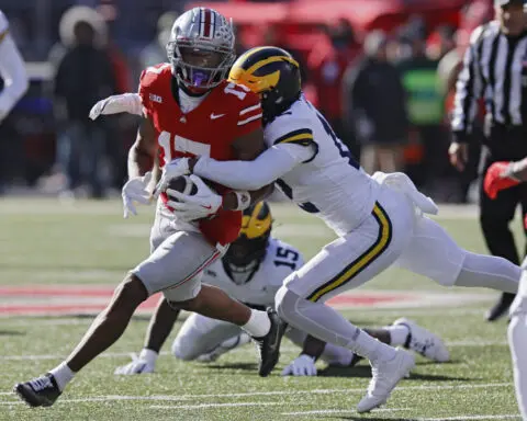 Michigan, Ohio State players brawl after Wolverines beat No. 2 Buckeyes. Police use pepper spray