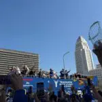 ‘We earned it,’ Dodgers fan says as thousands flock to parade in downtown L.A.