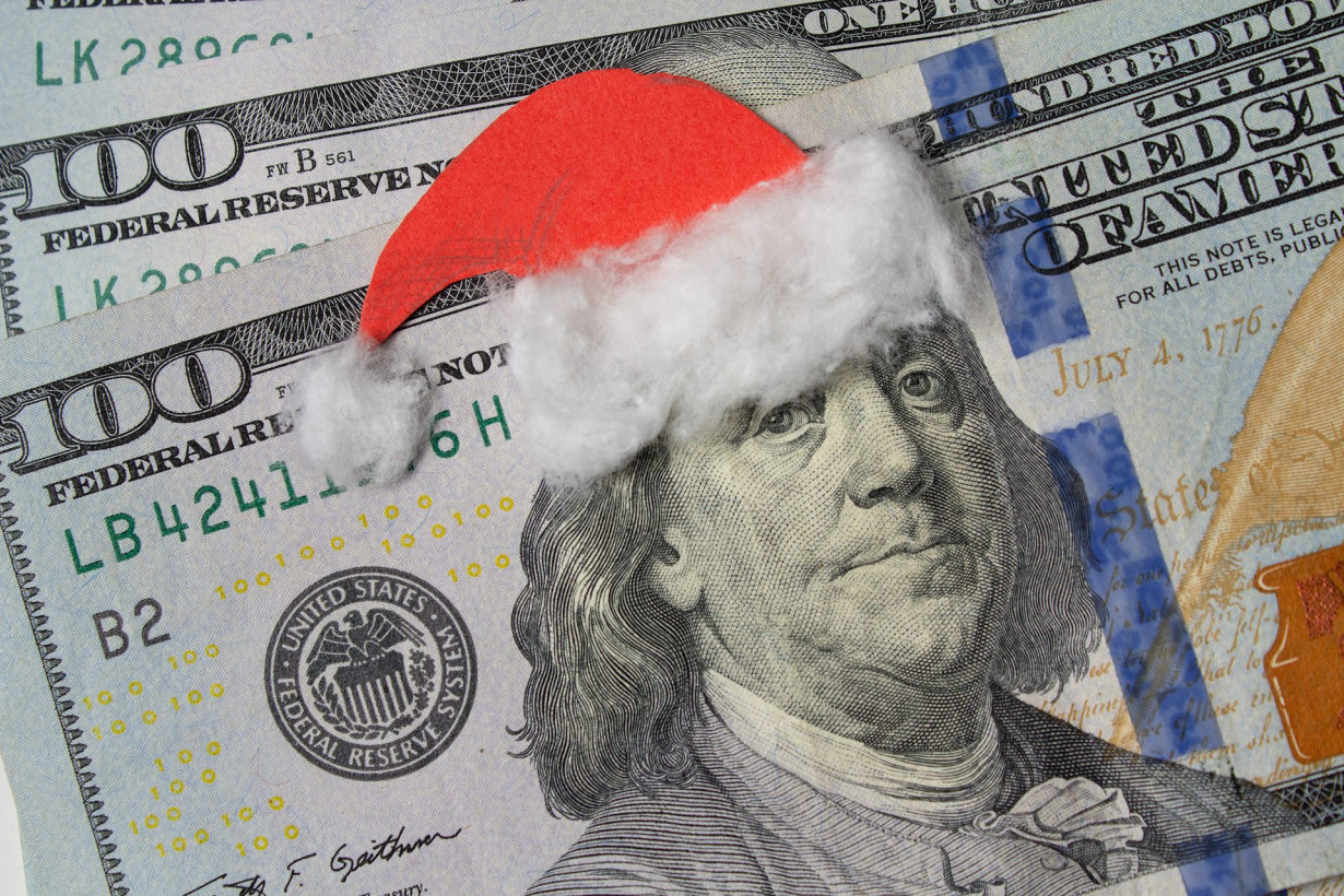 To control your spending this holiday season, stick with cash