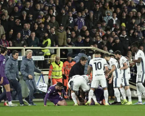 Serie A match abandoned after Fiorentina player collapses on field,