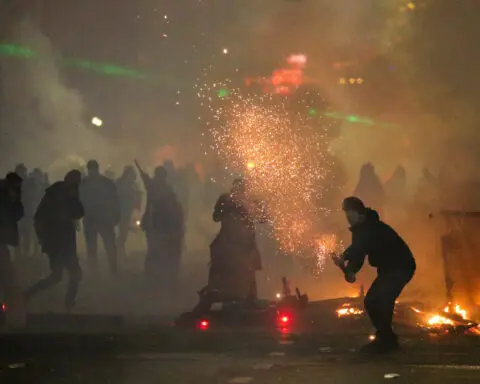 Protests in Georgia spread as PM defies US condemnation