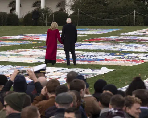 Biden displays AIDS Memorial Quilt at White House to observe World AIDS Day